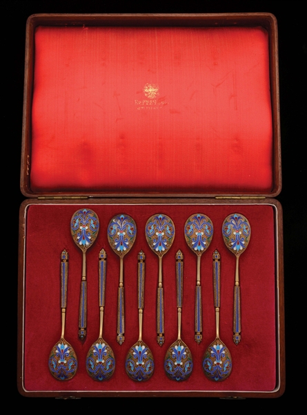 SET OF 10: RUSSIAN ENAMEL SPOONS IN FITTED WOODEN CASE.