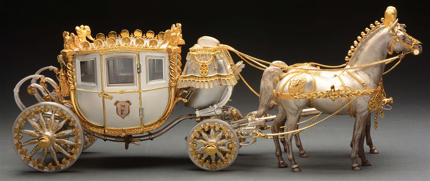 STERLING SILVER STAGE COACH PULLED BY TWO HORSES.