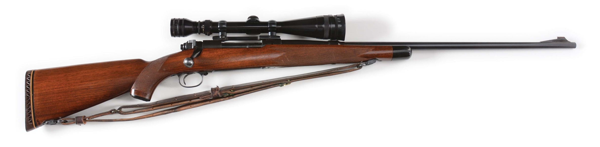 (C) WINCHESTER MODEL 70 SUPER GRADE BOLT ACTION RIFLE WITH SCOPE (1950).
