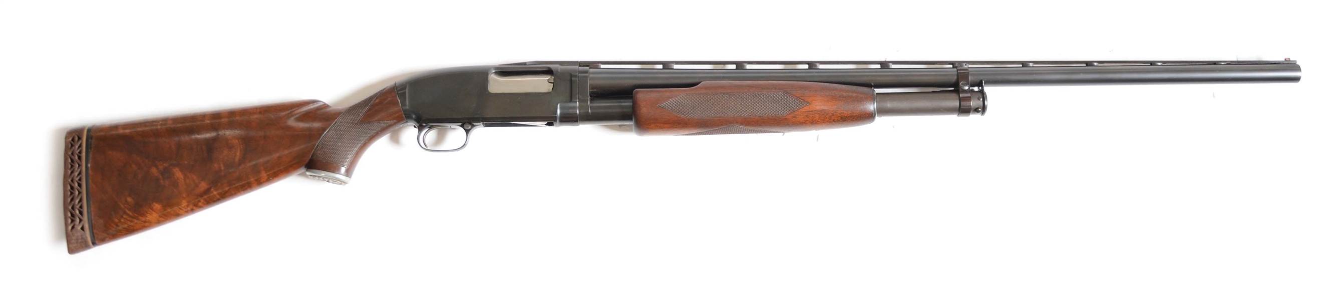(C) WINCHESTER MODEL 12 12 BORE PUMP SHOTGUN (1955).