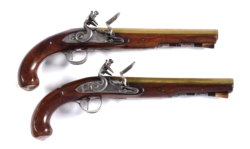 (A) A GOOD PAIR OF SILVER MOUNTED BRASS-BARRELED ENGLISH FLINTLOCK OFFICERS/DUELING PISTOLS BY J&W RICHARDS CIRCA 1799.