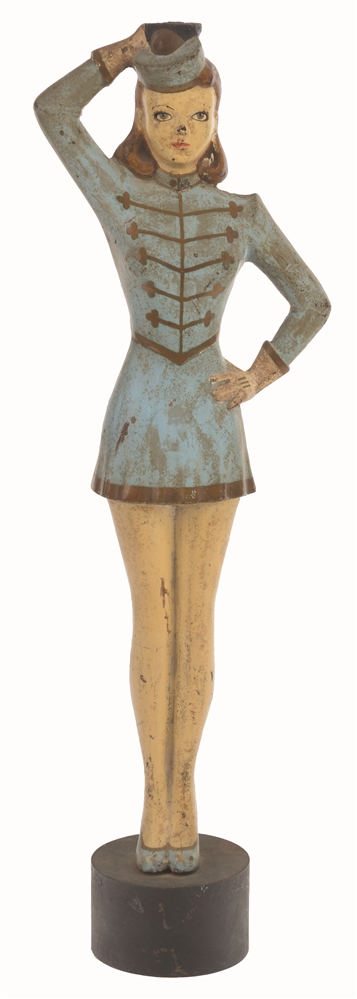 CAST-IRON YOUNG LADY MAJORETTE PARADE LEADER DOORSTOP.