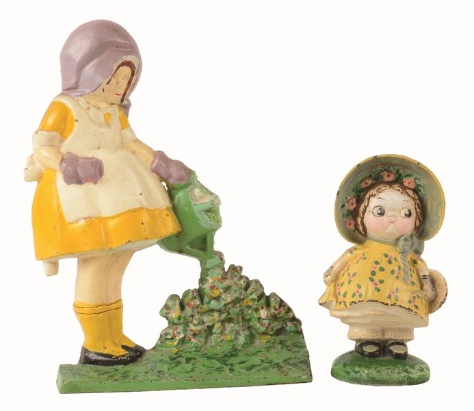 LOT OF 2: CAST-IRON DOLLY & MARY QUITE CONTRARY DOORSTOPS.