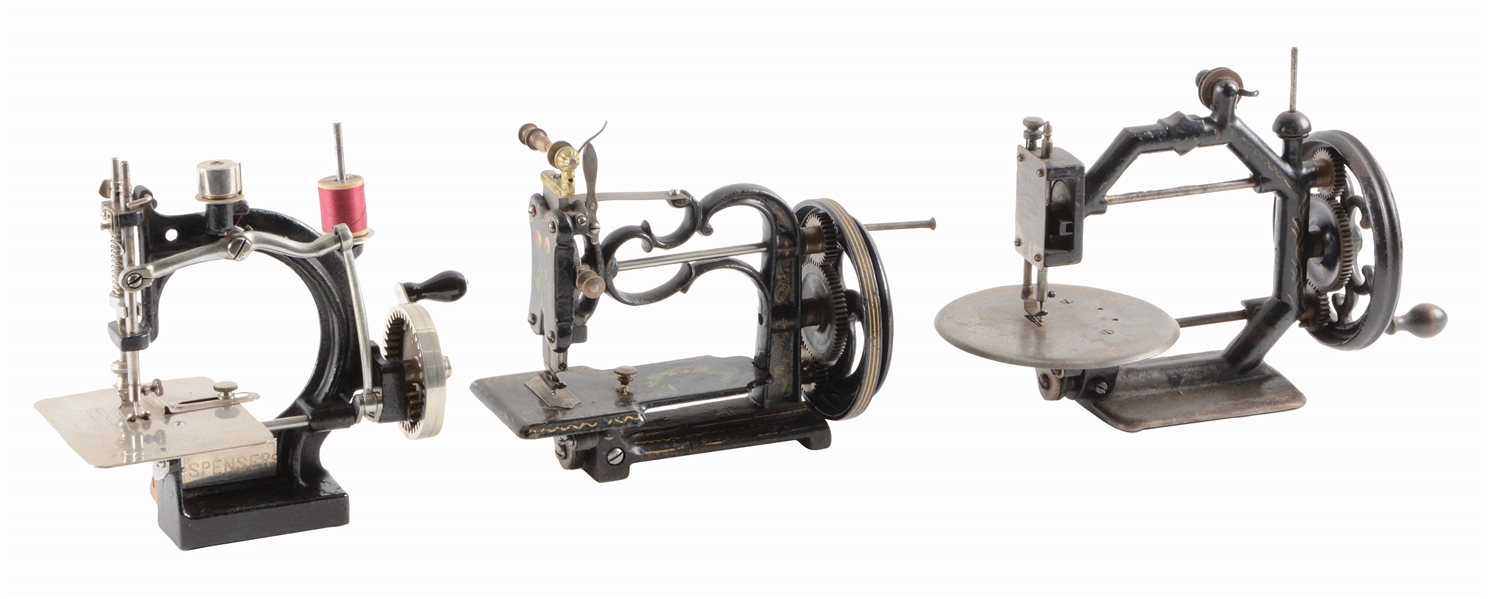 LOT OF 3: SEWING MACHINES, SPENCER WITH PAPERWORK, GOLD METAL.