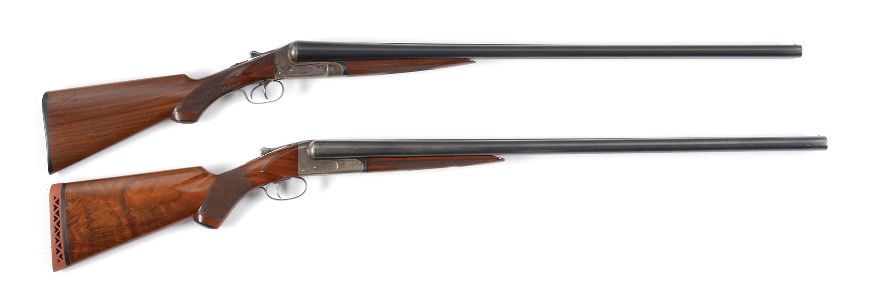 (C) LOT OF TWO: TWO ITHACA NID SIDE BY SIDE SHOTGUNS.