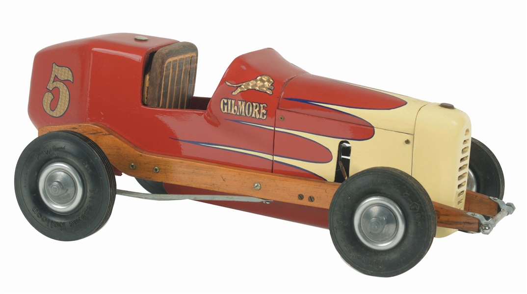 CONTEMPORARY WOOD AND METAL 20" GILMORE RACE CAR.