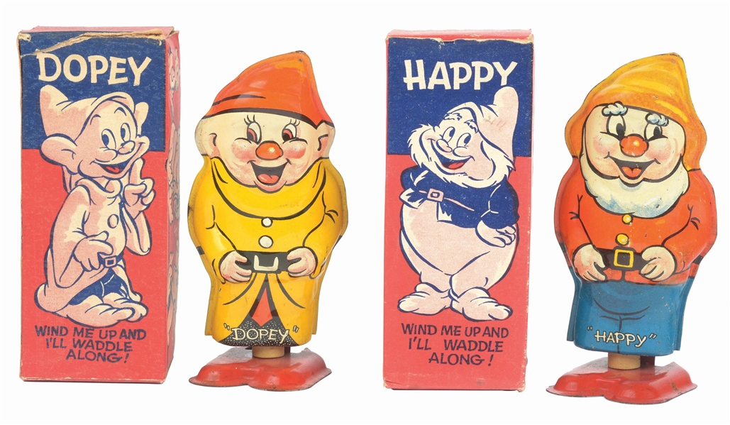 LOT OF 2: ENGLISH TIN-LITHO WIND-UP HAPPY AND DOPEY DWARF TOYS IN ORIGINAL BOXES.