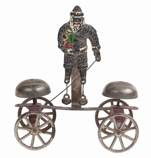 ATTRIBUTED TO WATROUS SCARCE CAST IRON AND SHEET METAL SANTA BELL TOY.