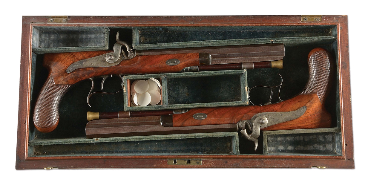 (A) A FINE CASED PAIR OF SAW HANDLED PERCUSSION DUELING PISTOLS RETAILED BY P. VALLEE, PHILADELPHIA, OWNED BY PROMINENT PHILADELHPIAN H. PRATT MCKEAN, GREAT GREAT GRANDSON OF THOMAS MCKEAN.