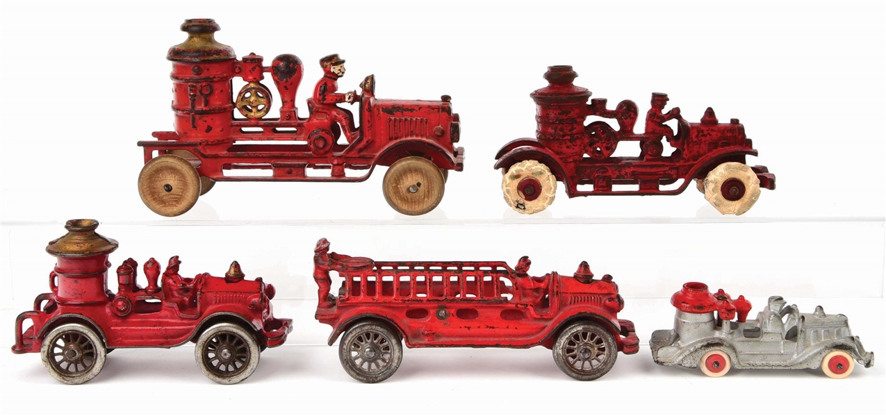 LOT OF 5: CAST-IRON AMERICAN MADE FIRE PUMPER AND LADDER TRUCKS.