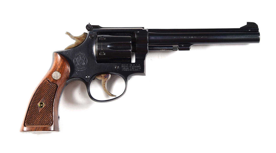 (C) SMITH & WESSON K-22 MASTERPIECE TARGET DOUBLE ACTION REVOLVER (1962).