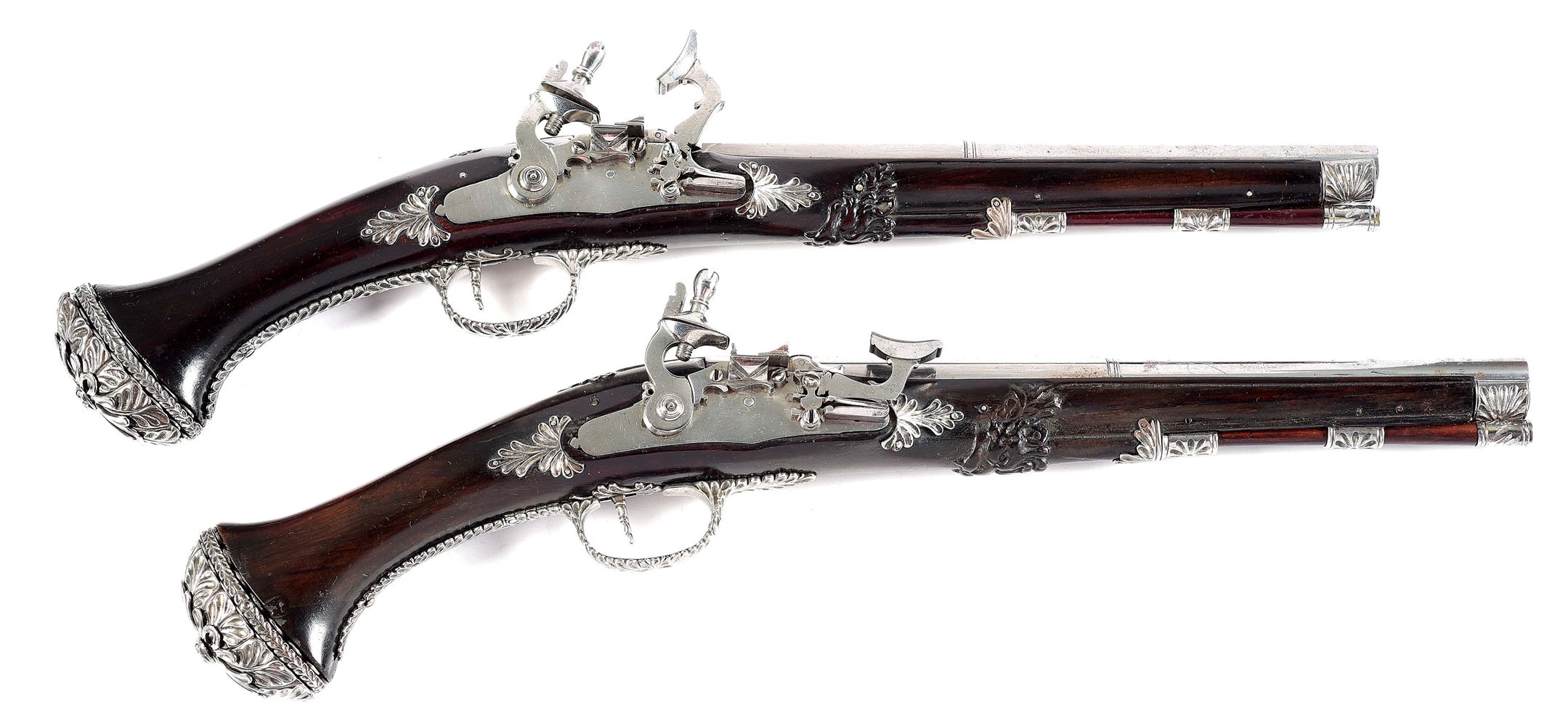 (A) SNAPHAUNCE PISTOLS WITH ORNATE MOUNTINGS IN THE STYLE OF 17TH CENTURY SWISS, EX. W.G. RENWICK.