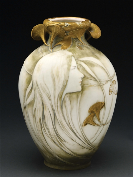MONUMENTAL AMPHORA CARVED BLOWOUT VASE WITH CALLA LILLIES.