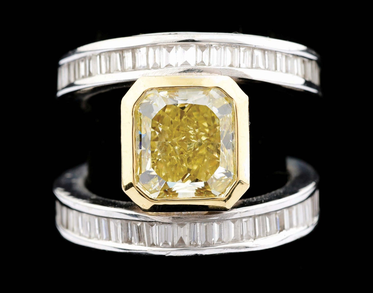 18K WHITE GOLD 4CT FANCY YELLOW DIAMOND RING WITH GIA REPORT AND APPRAISAL.