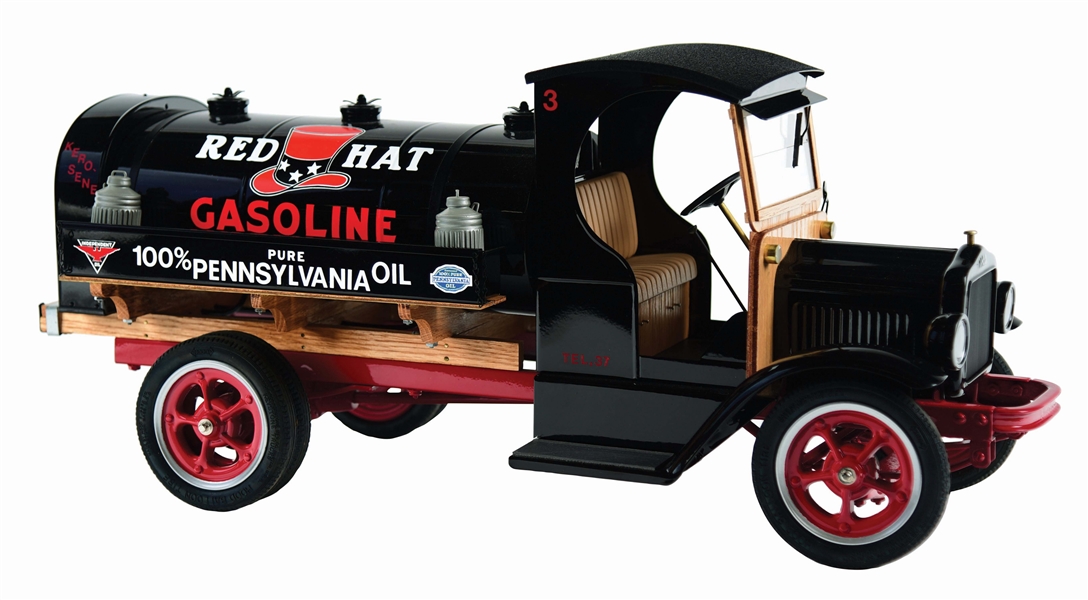 KING K. LIMITED EDITION MODEL SERVICE STATION TRUCK IN RED HAT GASOLINE LIVERY. 