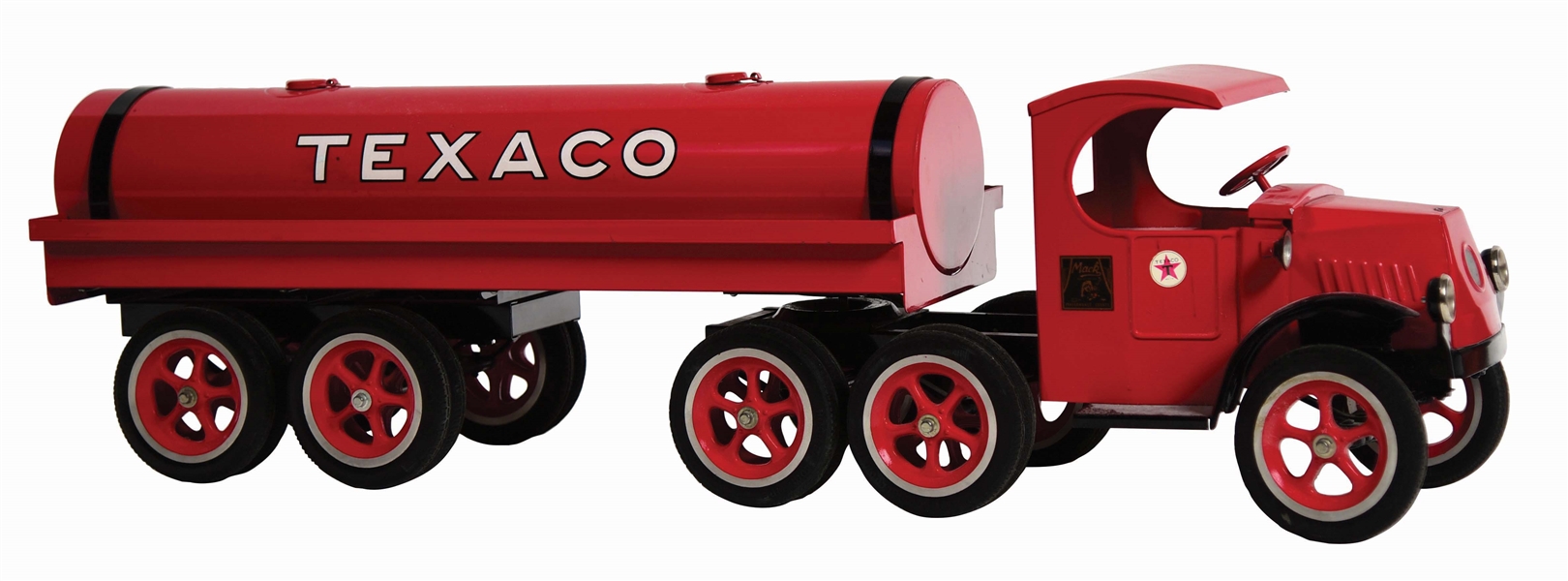 TEXACO GASOLINE PRESSED STEEL MACK TOY TANKER TRUCK MADE BY THE LES PAUL COLLECTOR SERIES. 