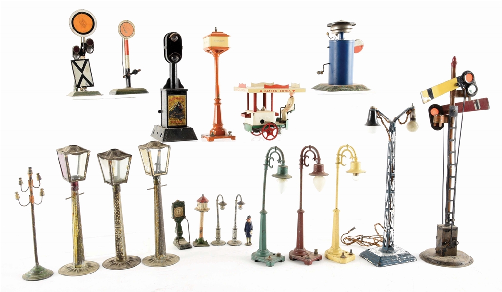 LOT OF VARIOUS EUROPEAN AND AMERICAN LAMP POLES AND TRAIN ACCESSORIES.