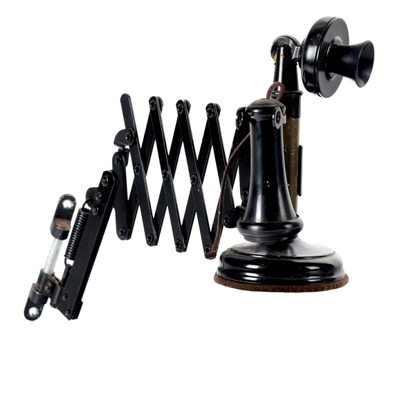 WALL-MOUNTED TELEPHONE WITH AN ORIGINAL ACCORDION BRACKET.