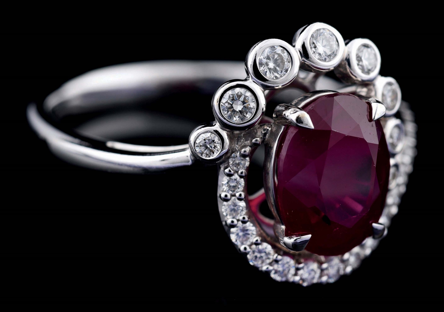 18K WHITE GOLD RUBY AND DIAMOND RING W/AGL REPORT.