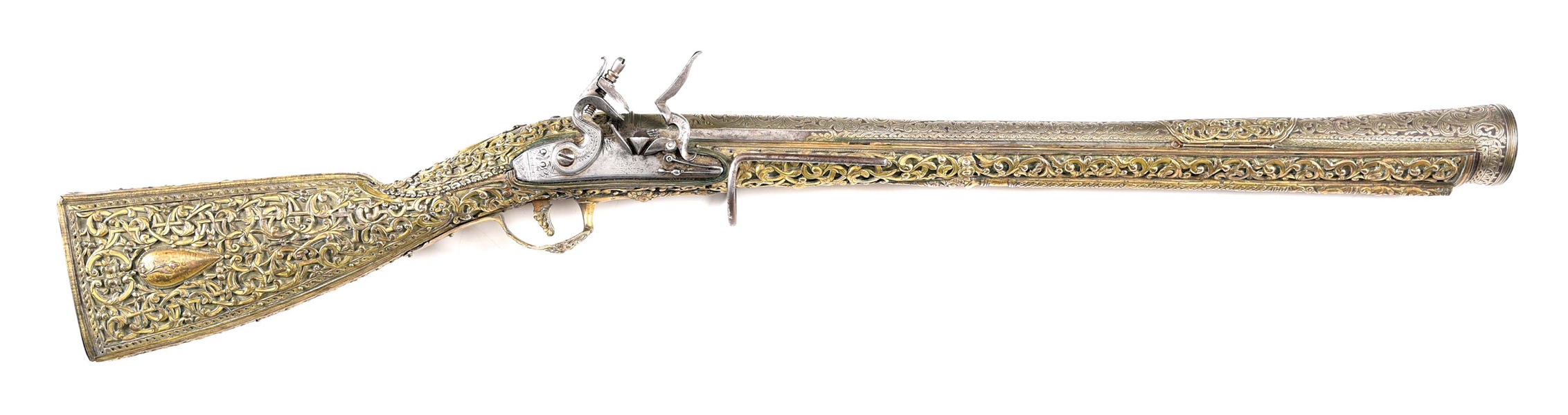 (A) A VERY SHOWY OTTOMAN BLUNDERBUSS WITH GILDED SILVER STOCK, OF THE KIND GIVEN TO MIDDLE EASTERN SULTANS.