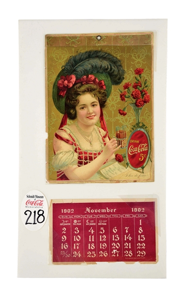 1902 CALENDAR TOP WITH A REMNANT OF THE 1902 CALENDAR. 
