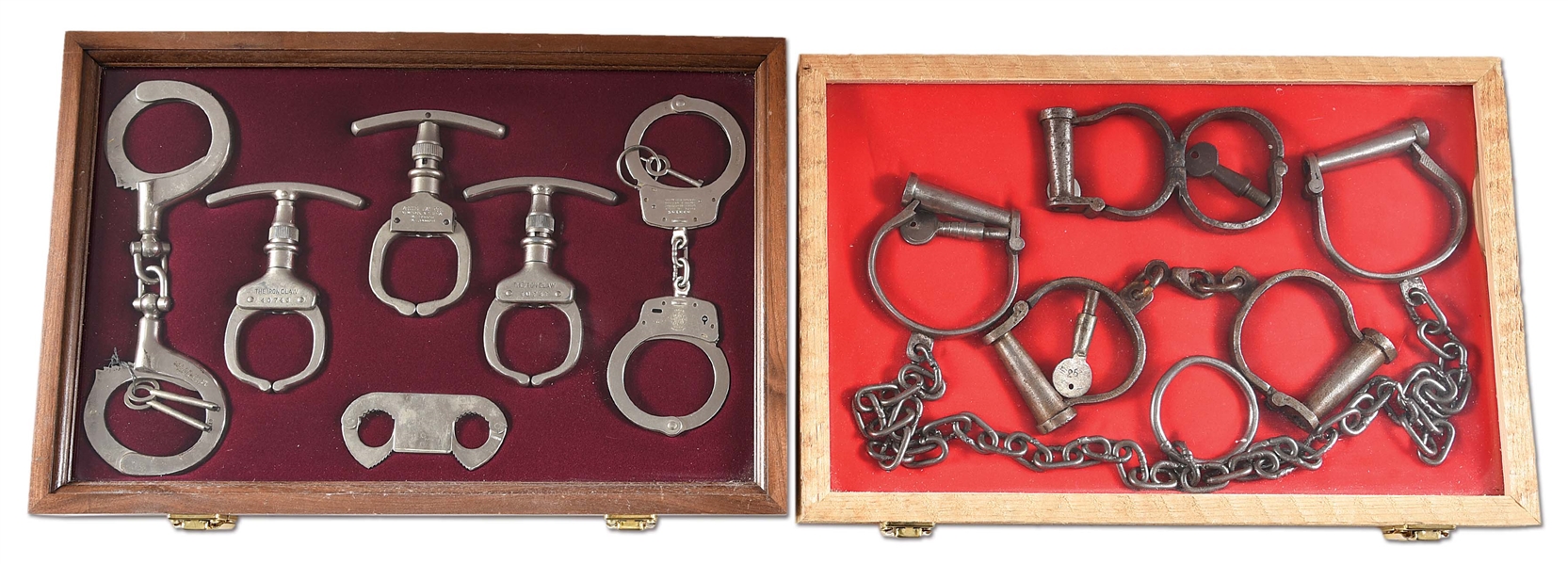 LOT OF 2: DISPLAYS OF VINTAGE HANDCUFFS AND RESTRAINTS.