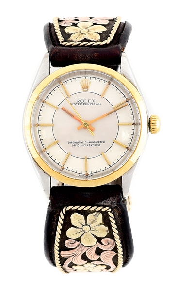 ROLEX OYSTER PERPETUAL WRISTWATCH WITH BOHLIN STERLING AND GOLD LEATHER BAND.