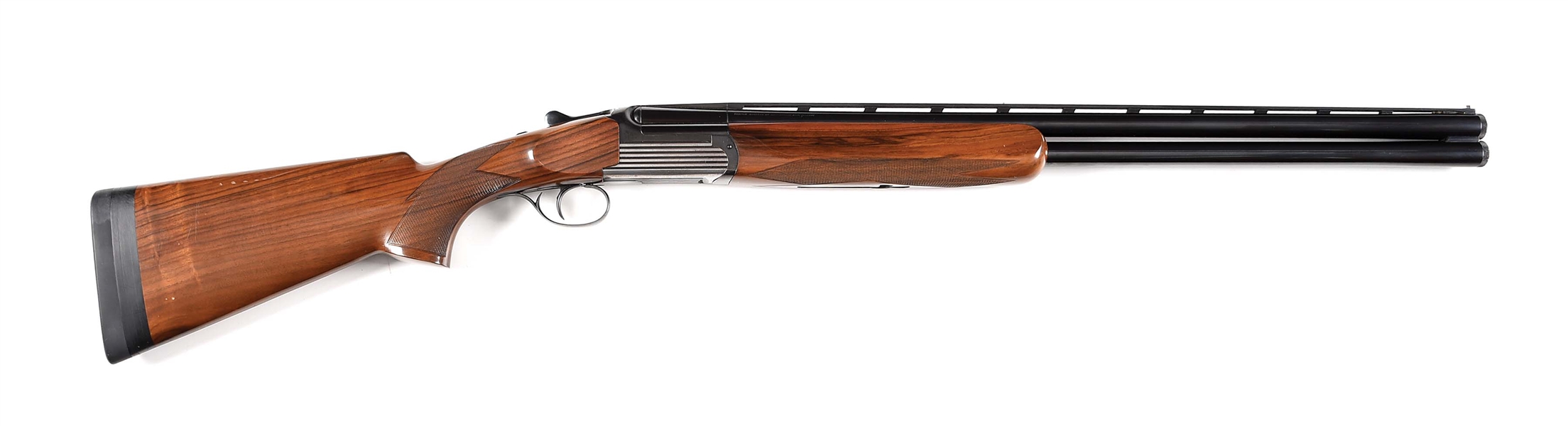 (M) ITHACA GUN CO. MODEL MT-6 OVER UNDER SHOTGUN MADE BY PERAZZI WITH BRILEY TUBES AND CASE.
