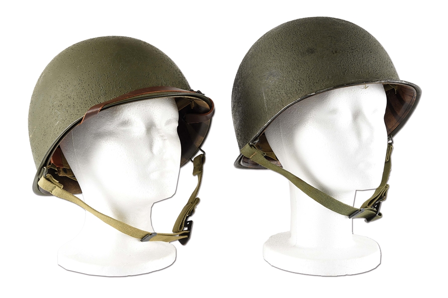 LOT OF 2: HIGH CONDITION US WORLD WAR II FRONT SEAM SWIVEL BALE HELMETS WITH LINERS.