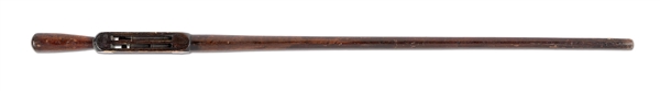 CARVED WOODEN CANE WITH WOODEN BULLETS.