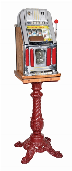 25¢ MILLS ARROW-HEAD LIGHT-UP SLOT MACHINE WITH STAND.
