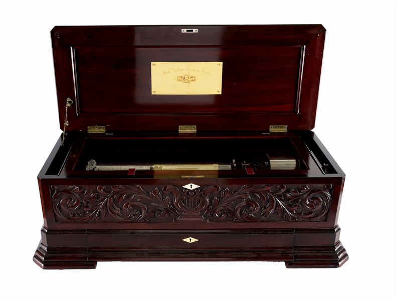 MERMOD FRERES 18" CYLINDER MUSIC BOX IN BEAUTIFUL CARVED MAHOGANY CASE.