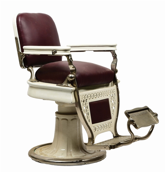 THEO A KOCHS COMPANY CHICAGO AND NORTHWESTERN LINE RAILROAD BARBER CHAIR.