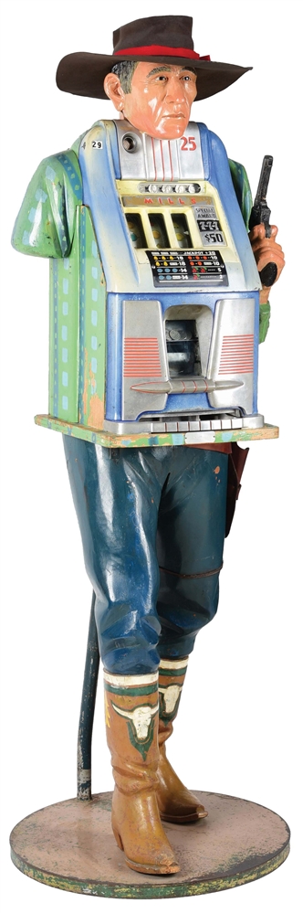 FRANK POLK CARVED ONE-ARMED BANDIT SLOT MACHINE STAND WITH A 25¢ MILLS 777 HIGH-TOP SLOT MACHINE.