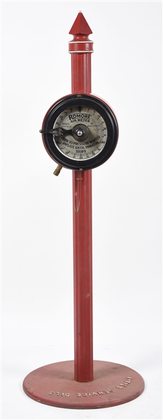 ROMORT CLOCK FACE AIR METER MOUNTED ON METAL BASE W/ FLUTED POLE. 