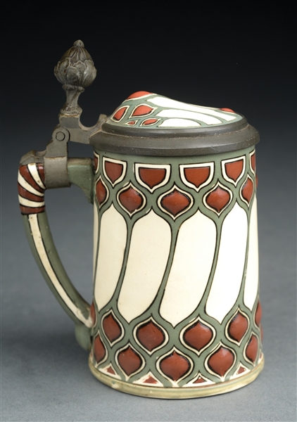 ART NOUVEAU DECORATED EARTHERNWARE AND PEWTER VILLEROY & BOCK METTLACH BEER STEIN.