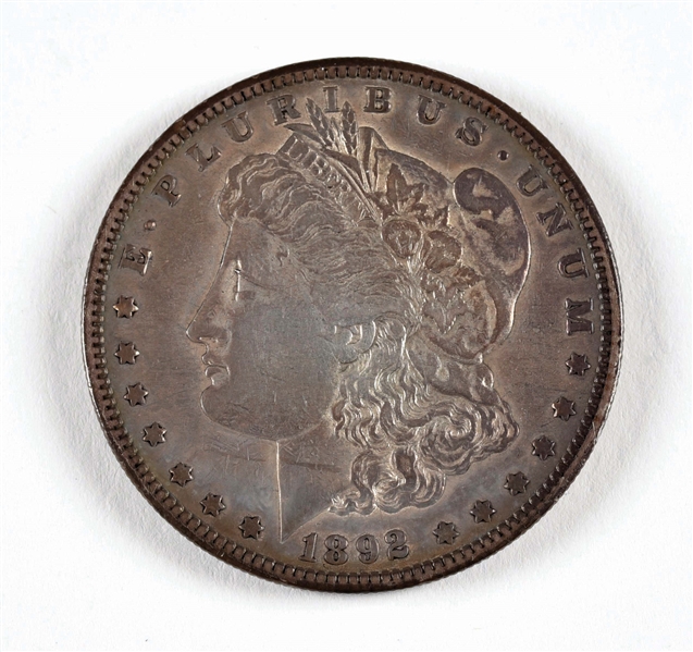 1892-S MORGAN SILVER DOLLAR, TONING, EF+.