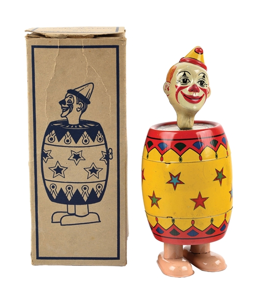 CHEIN TIN LITHO WIND-UP CLOWN IN BARREL TOY.