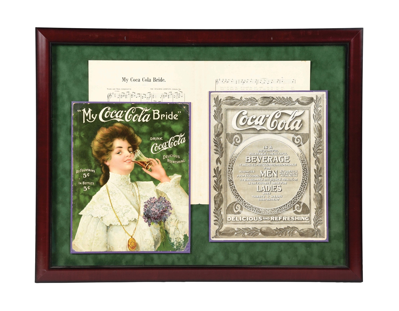 BEAUTIFULLY FRAMED SELECTION OF COCA-COLA MUSIC SHEETS.