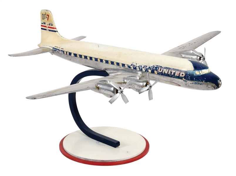 UNITED AIRLINES DC-7 MAINLINER ALUMINUM DESK MODEL.