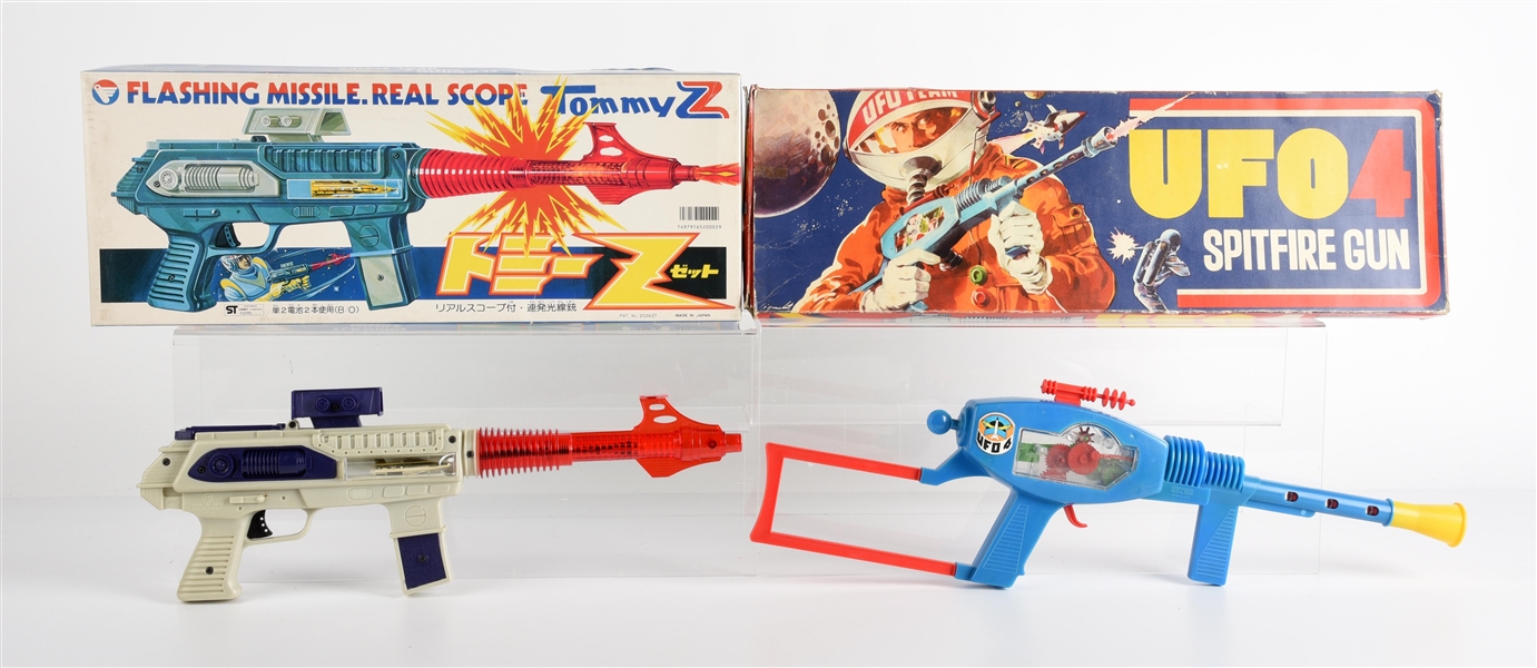 LOT OF 2: JAPANESE & ITALIAN MADE PLASTIC BATTERY OPERATED & FRICTION SPACE RIFLES IN ORIGINAL BOXES .