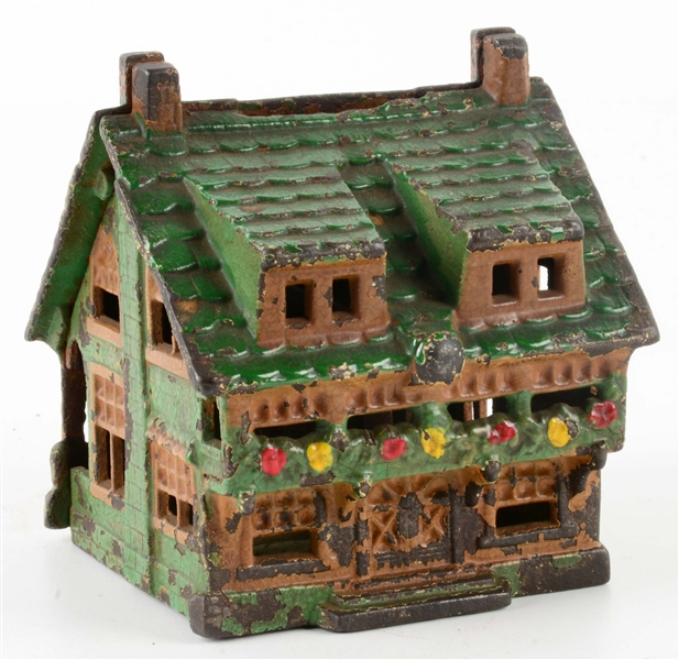 UNUSUAL AMERICAN-MADE CAST IRON GINGERBREAD HOUSE-TYPE BANK.