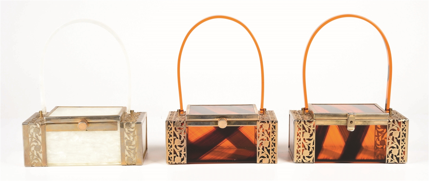 LOT OF 3: TORTOISE SHELL & FROSTED WHITE LUCITE BAGS.