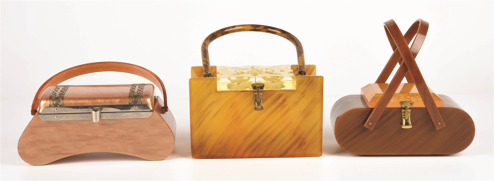 LOT OF 3: LLEWELLYN AND MISC. BROWN LUCITE BAGS.