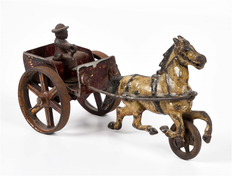 CAST IRON AMERICAN-MADE HORSE-DRAWN TOY.