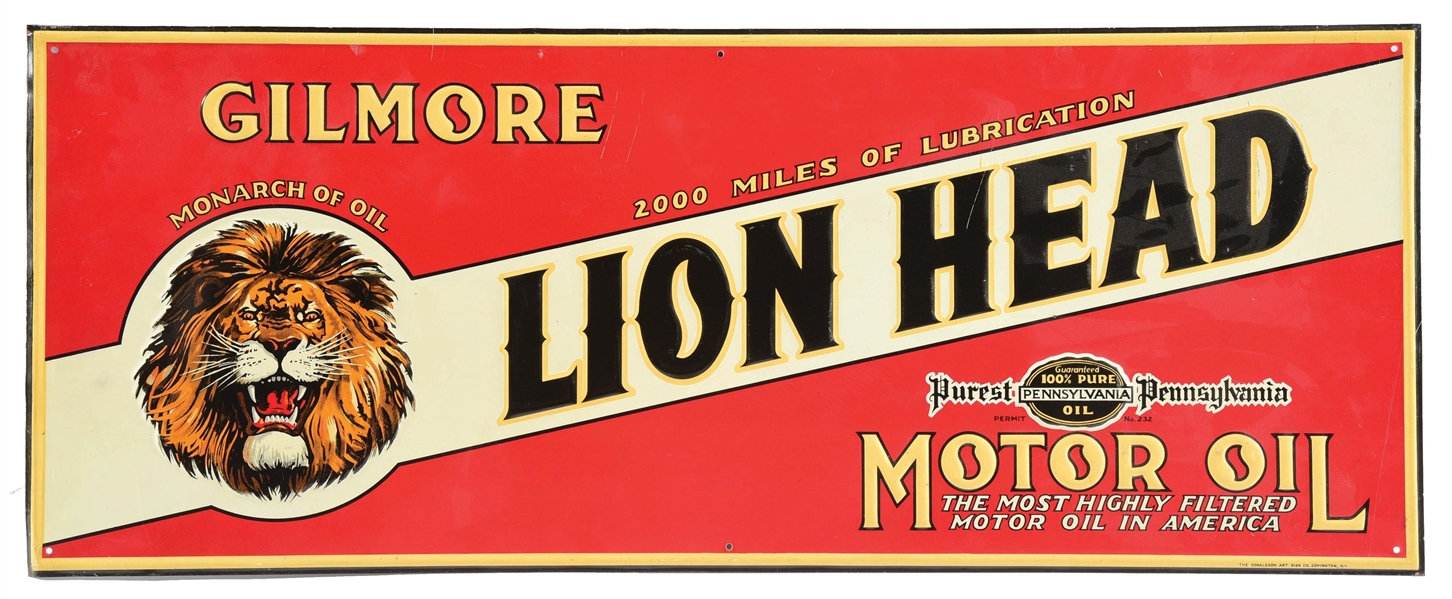GILMORE LION HEAD MOTOR OILS EMBOSSED TIN SIGN W/ LION GRAPHIC. 