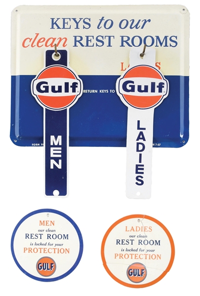 GULF "KEYS TO OUR CLEAN REST ROOMS" TIN SIGN W/ KEY CHAIN ATTACHMENTS. 