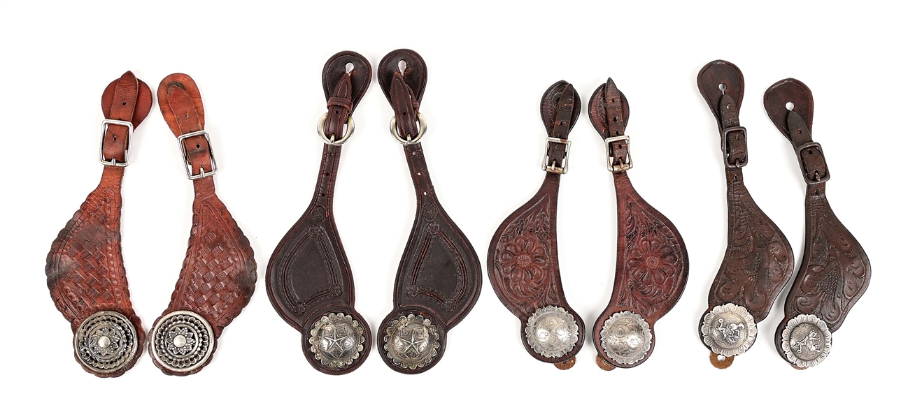LOT OF 4: ANTIQUE WESTERN SPUR STRAPS WITH SILVER CONCHOS.