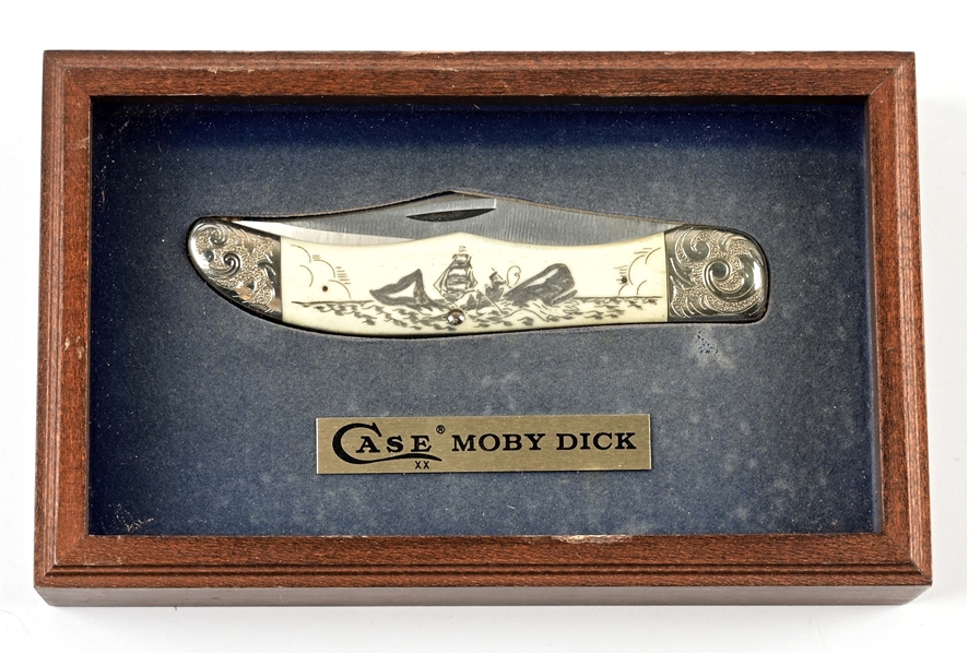 CASE MOBY DICK COMEMMORATIVE FOLDING KNIFE WITH IVORY SCRIMSHAW HANDLE AND SILVER MOUNTS WITH DISPLAY CASE.