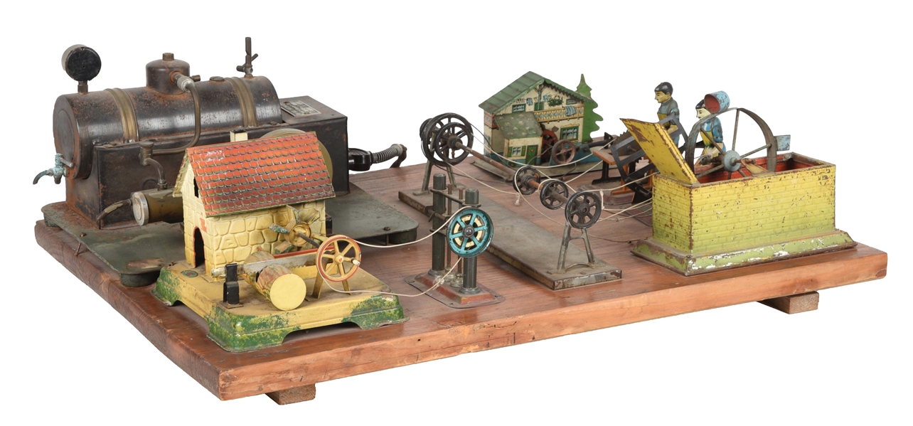 UNUSUAL GERMAN TIN LITHO ON WOODEN BOARD STEAM ENGINE & ACCESSORY SET.